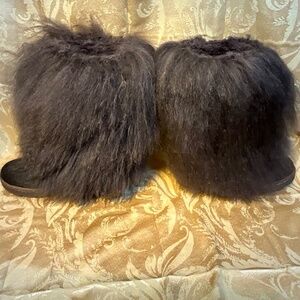 Faux furry winter boots. Really fun to wear, and compliments galore.  90-T4